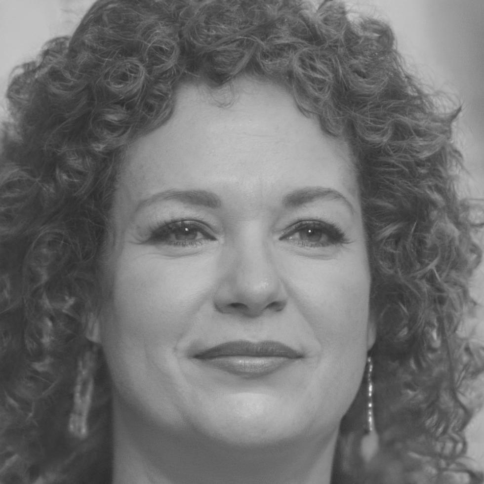 Professional headshot of Petra Vančíková in business setting